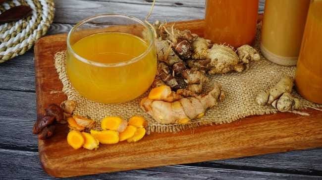 Authentic Jamu Kunyit Asam from Indonesia — traditional Indonesian drink with step-by-step cooking instructions
